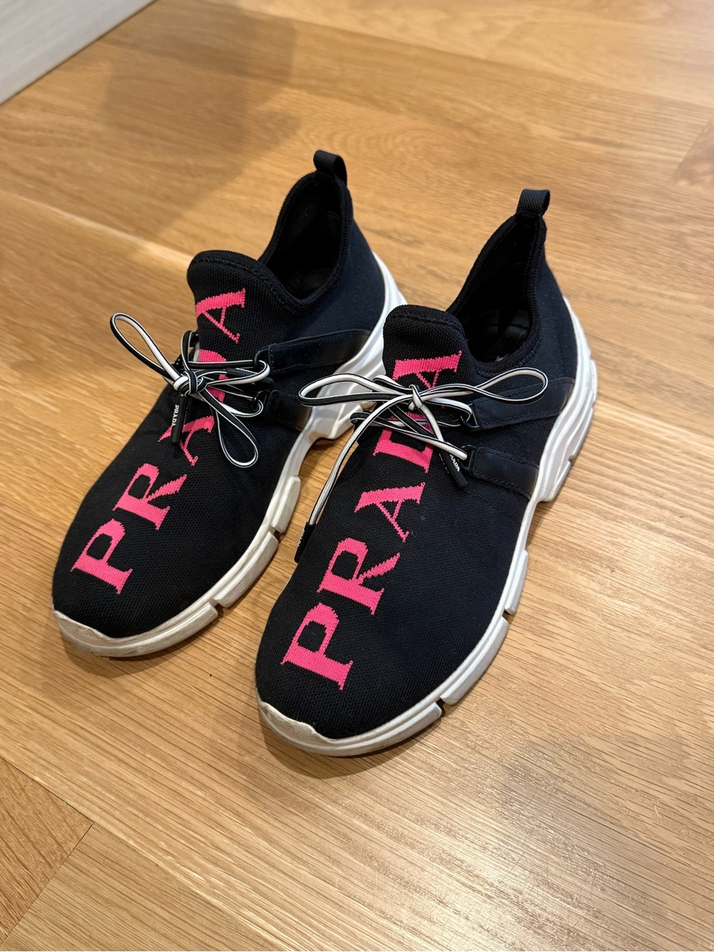 Prada Black Knit Slip-On Sneakers with Pink Logo
